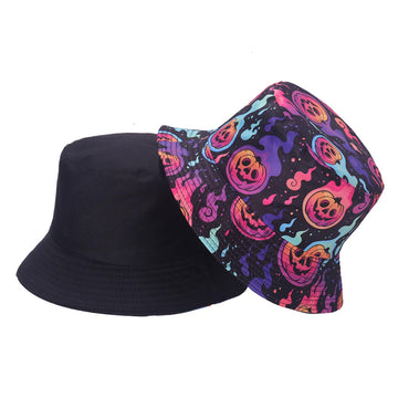 Reversible bucket hat with skull pumpkin print on one side