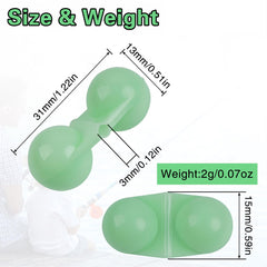 Close-up of dual stainless steel rattles inside the beads