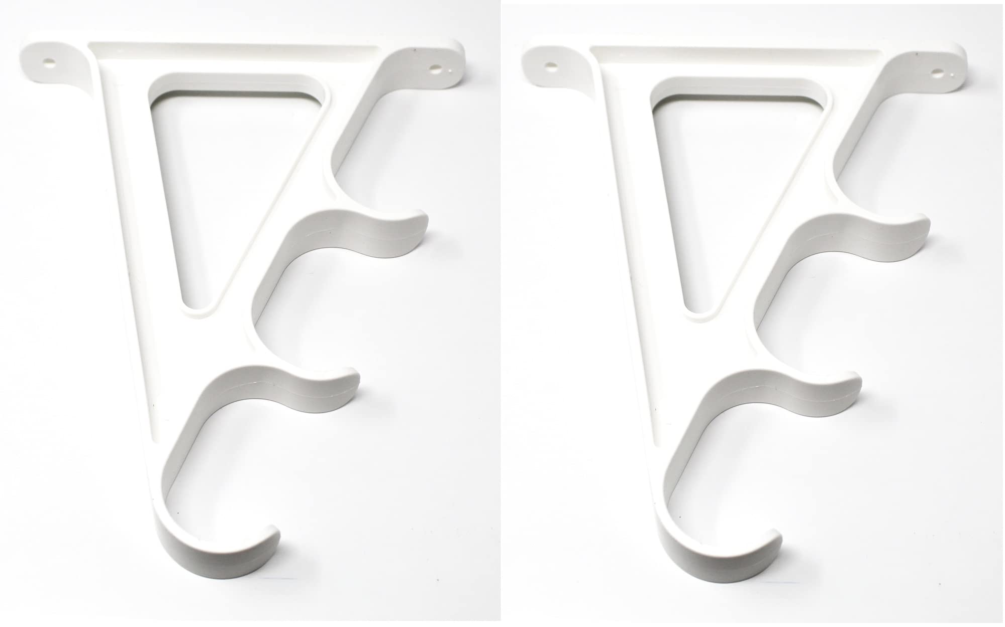 JSP Manufacturing wall rack with two arms on white wall for pole organization.