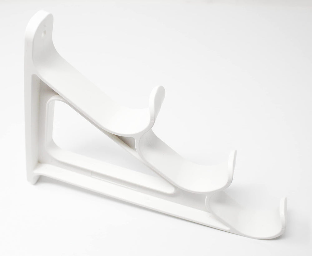 JSP Manufacturing ski pole wall rack keeps ski poles neatly aligned.