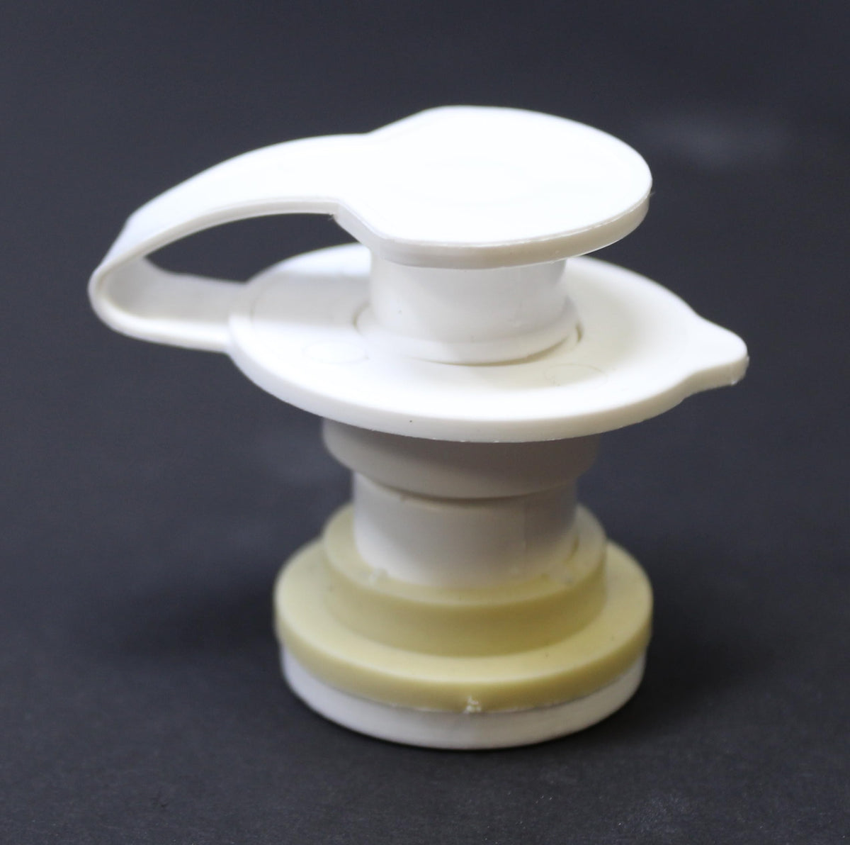 JSP Manufacturing white 1.5-inch shaft drain plug assembly for Coleman Xtreme, easy replacement.
