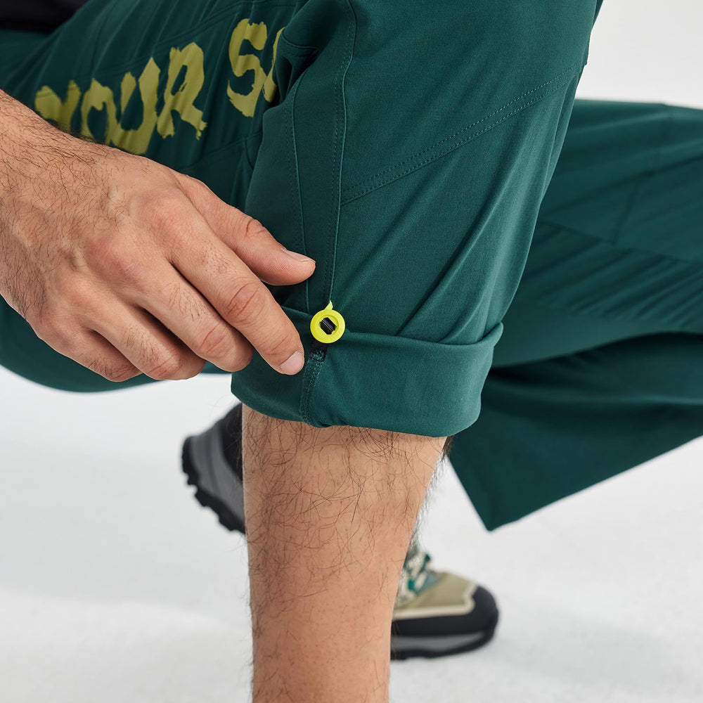 KAILAS dark green cargo pants in action during rock climbs and hikes