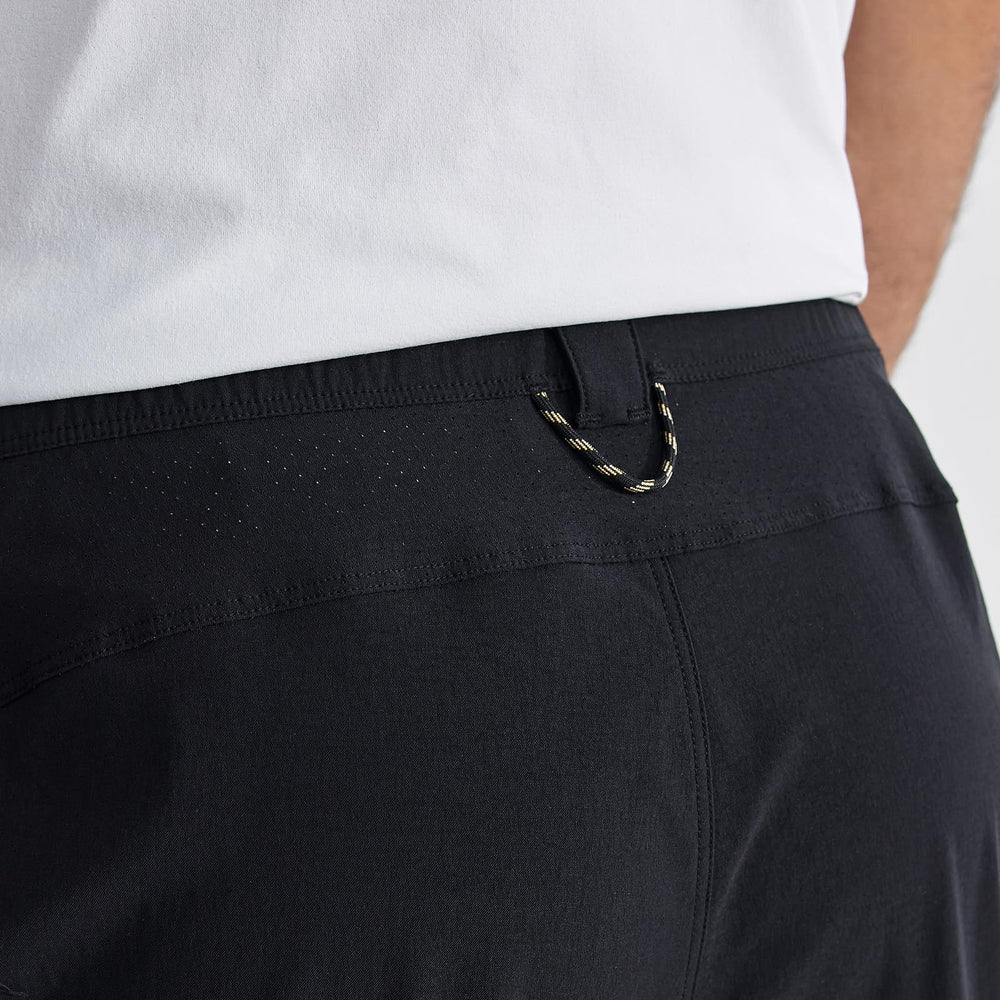 KAILAS pants feature water-repellent finish and reinforced stitching for durable outdoor use.