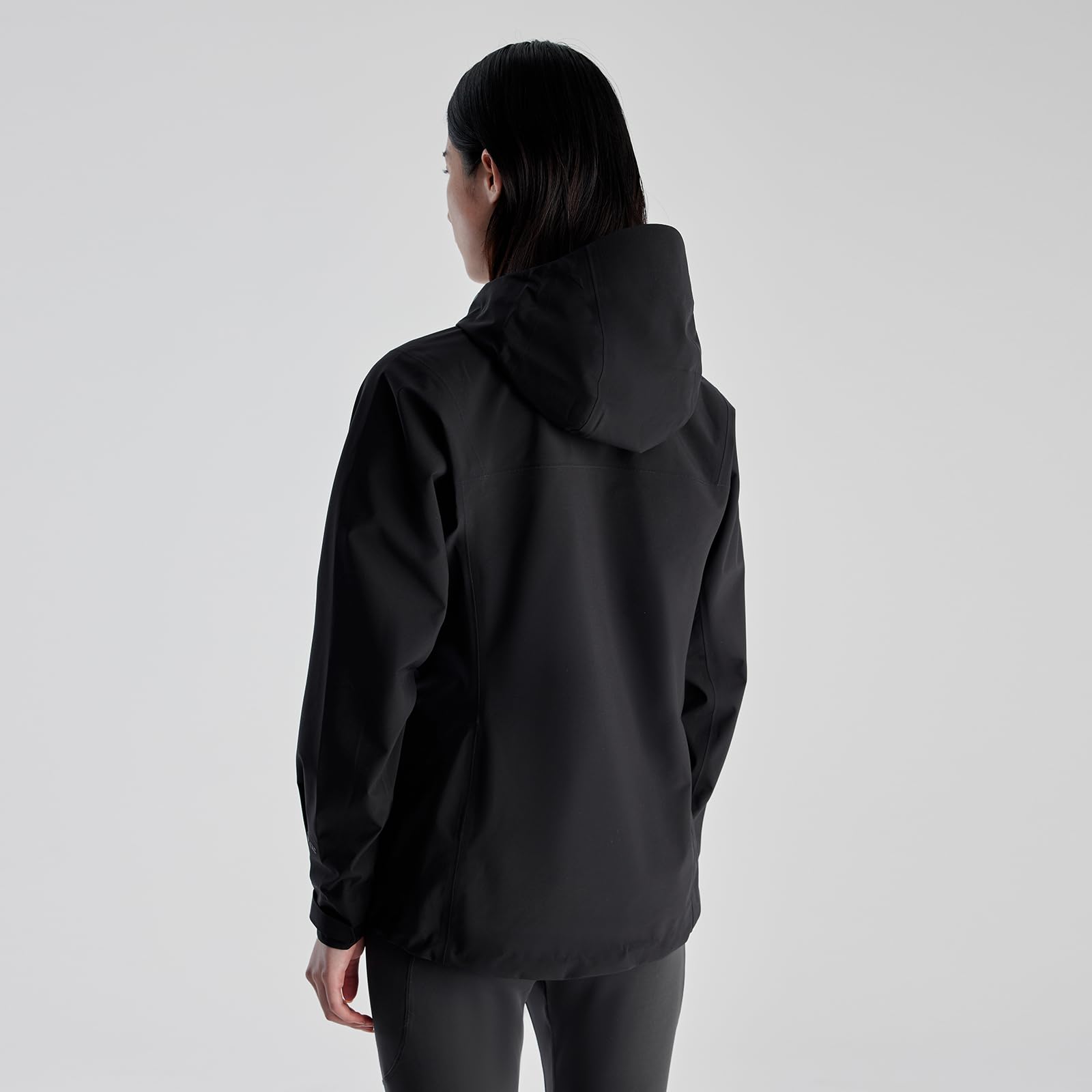 KAILAS women's hiking jacket pocket design shows backpack-compatible storage for quick access.