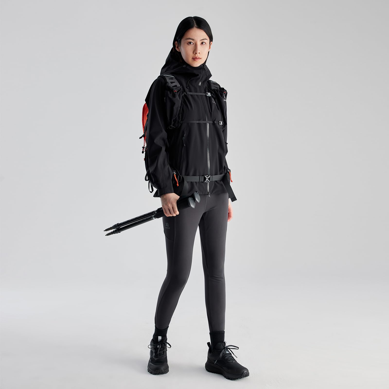 KAILAS waterproof hood up image highlighting full rain protection during showers
