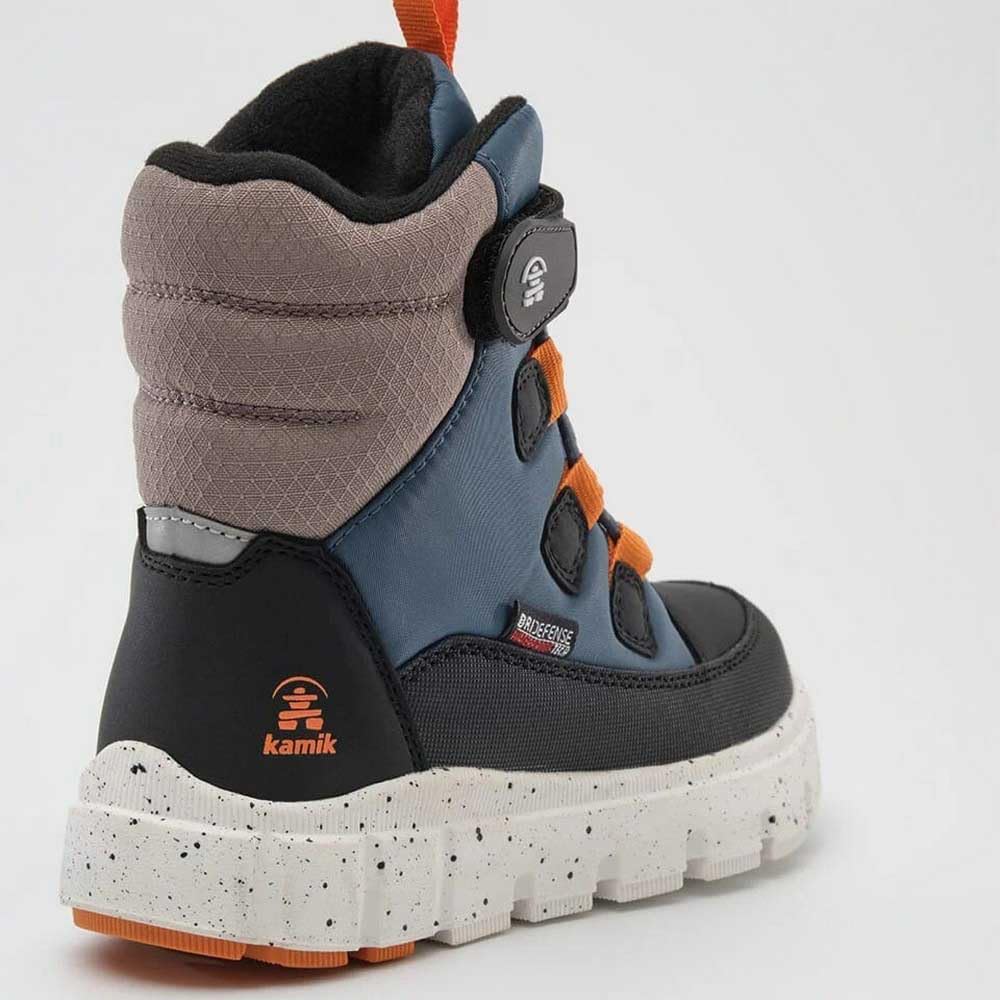 Kamik Seeker stormy-weather boot one-pull entry for quick on/off.