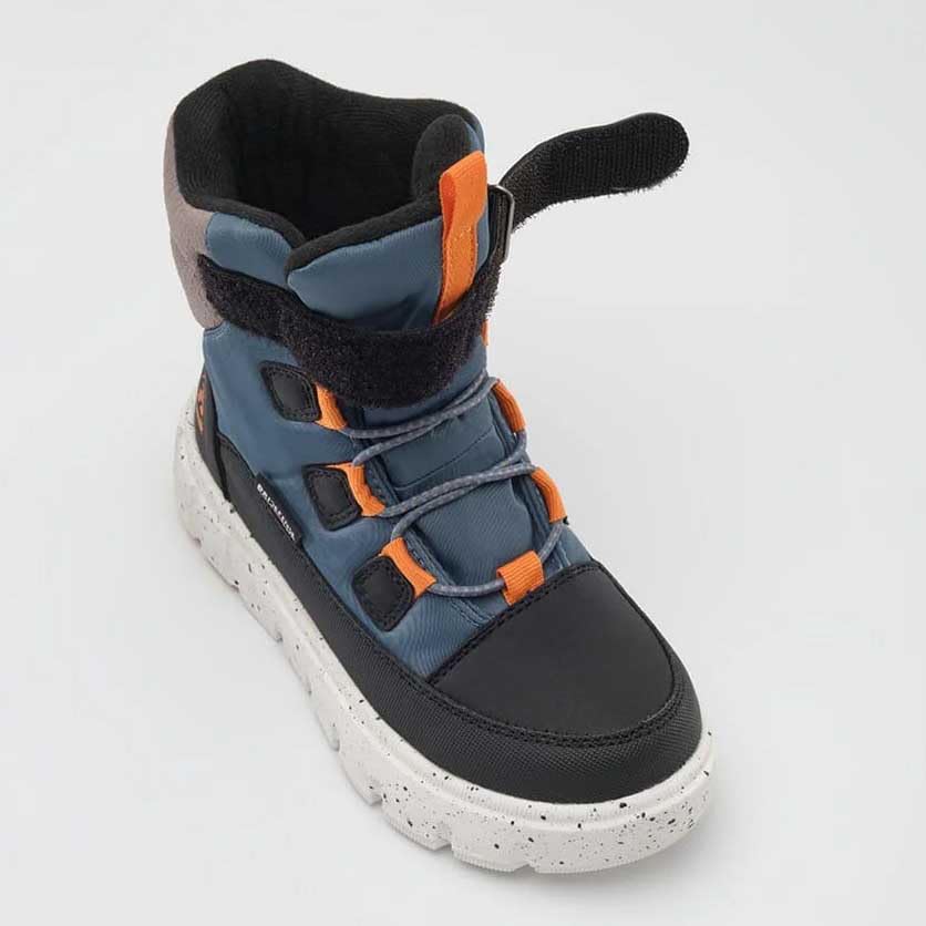 Waterproof lower section of Kamik Seeker boot protecting feet from slush.