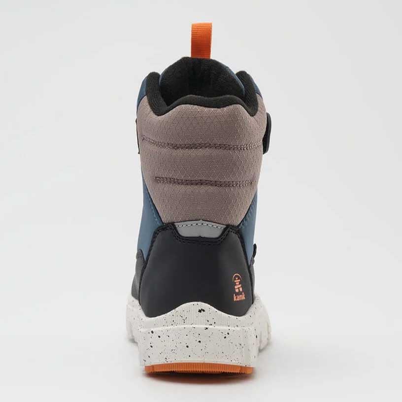 Waterproof material close-up reinforces durability against slush and puddles.