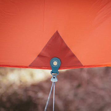 Kammok Kuhli Ultralight weather-protection highlights durable outdoor tarp performance.