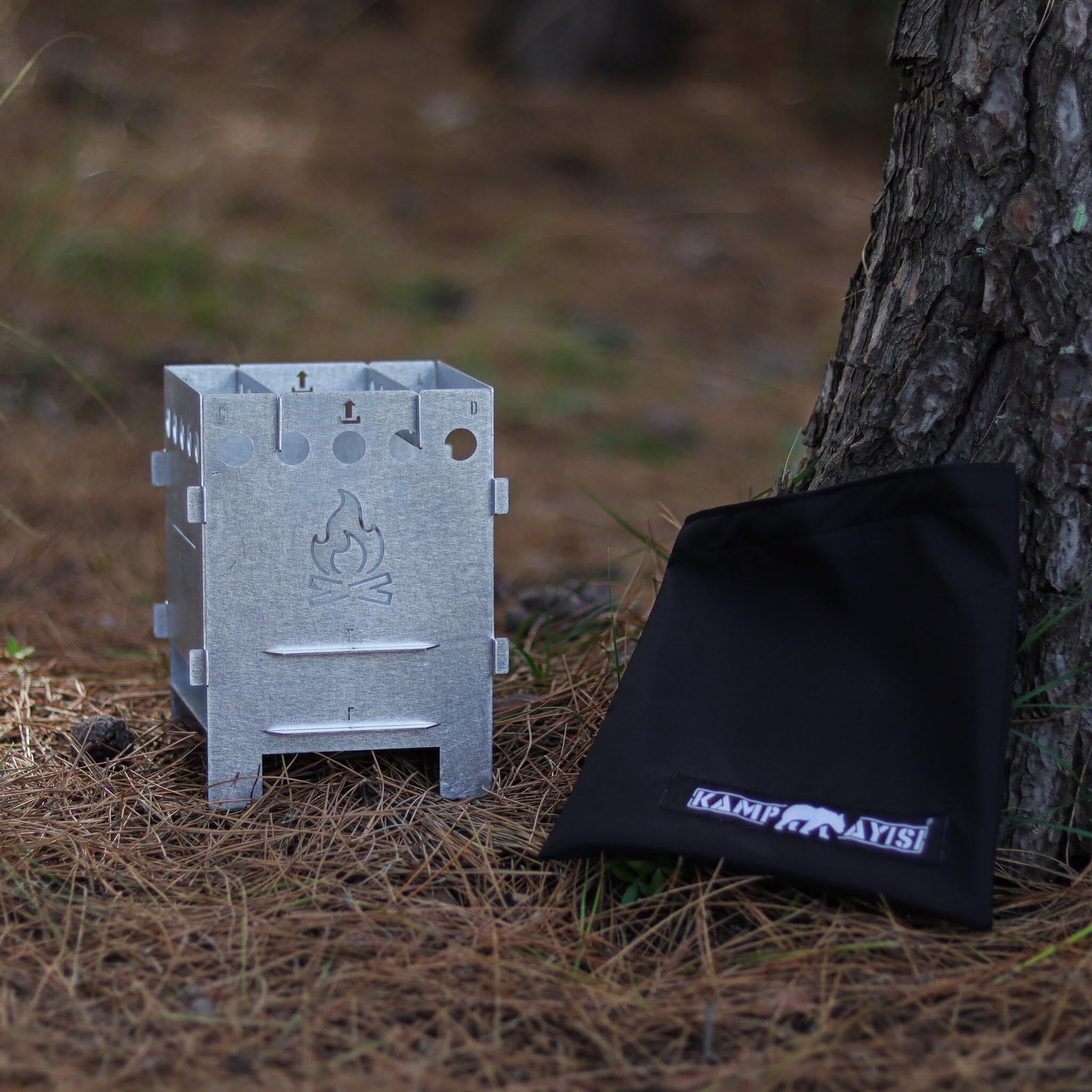 Kamp Ayisi portable camping stove highlighting its compact size and easy setup.