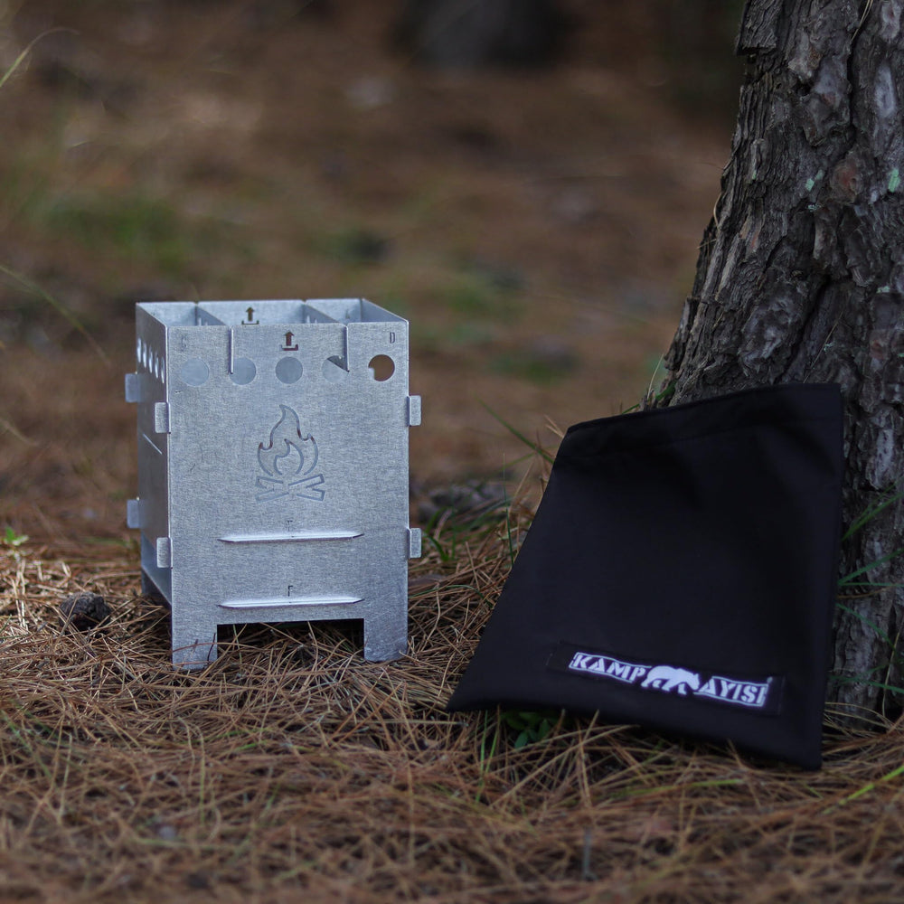 Kamp Ayisi portable camping stove highlighting its compact size and easy setup.