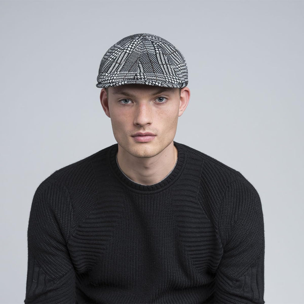 Kangol Pattern Flexfit Cap worn by model, demonstrating comfortable fit.