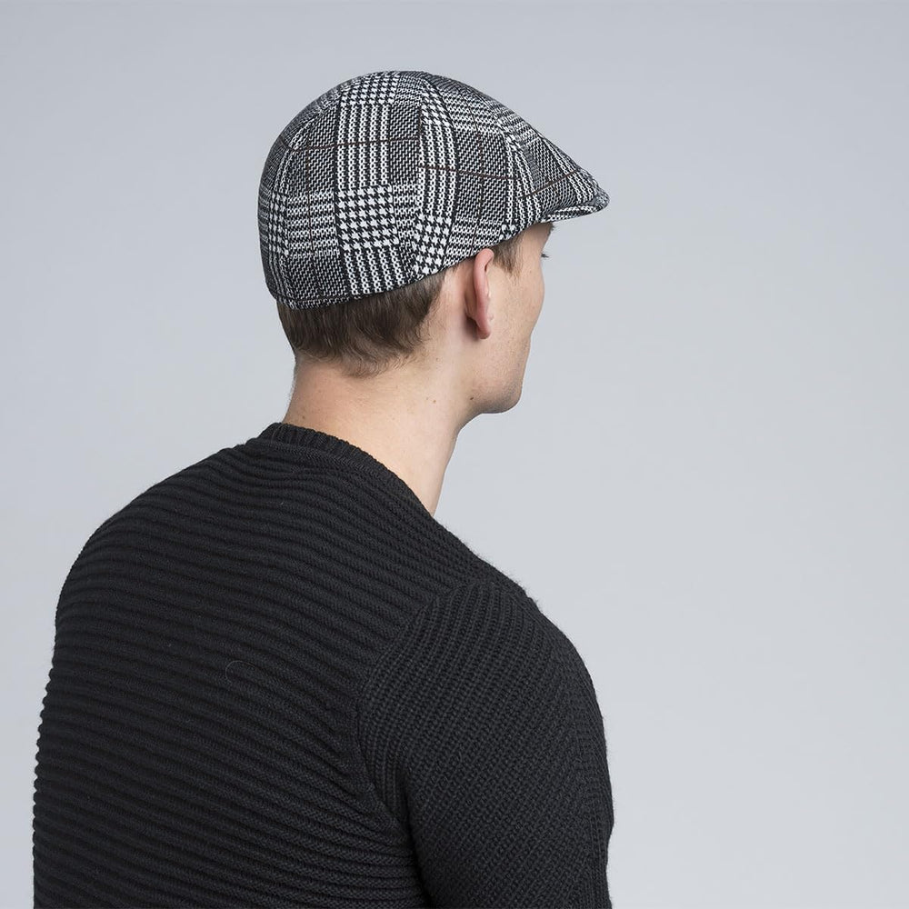 Kangol Pattern Flexfit Cap with sunglasses, lifestyle-ready accessory.