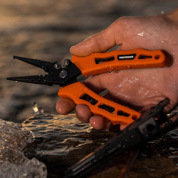 Pliers cutting fishing line during use