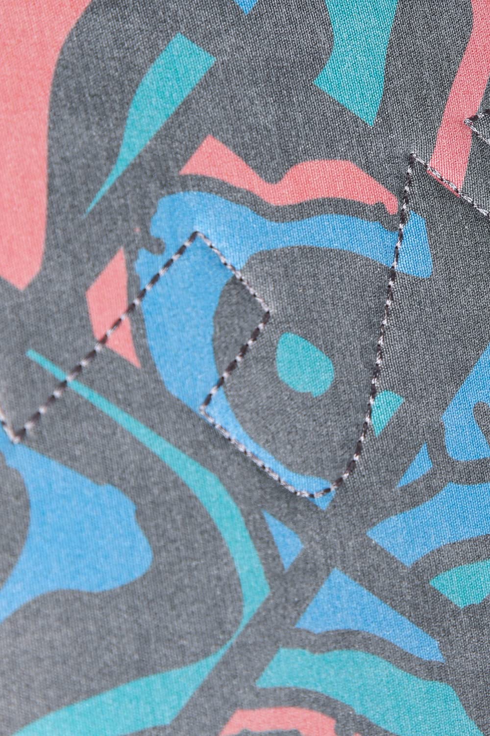KAVU Rope Sack Topo Smash back embroidery closeup emphasizes heritage branding.