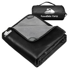KawaGebo Kamp fleece blanket on campsite keeps you dry on damp ground.