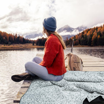 KawaGebo Kamp Sherpa blanket with waterproof seam-sealed construction outdoors.