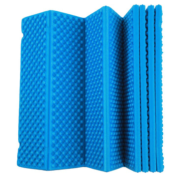 Keenso Double Egg Crate Sleeping Pad folded compact blue demonstrates portability for travel and camping.