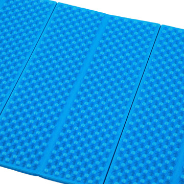 Keenso Double Egg Crate Sleeping Pad rolled compact blue shows easy packing and storage.