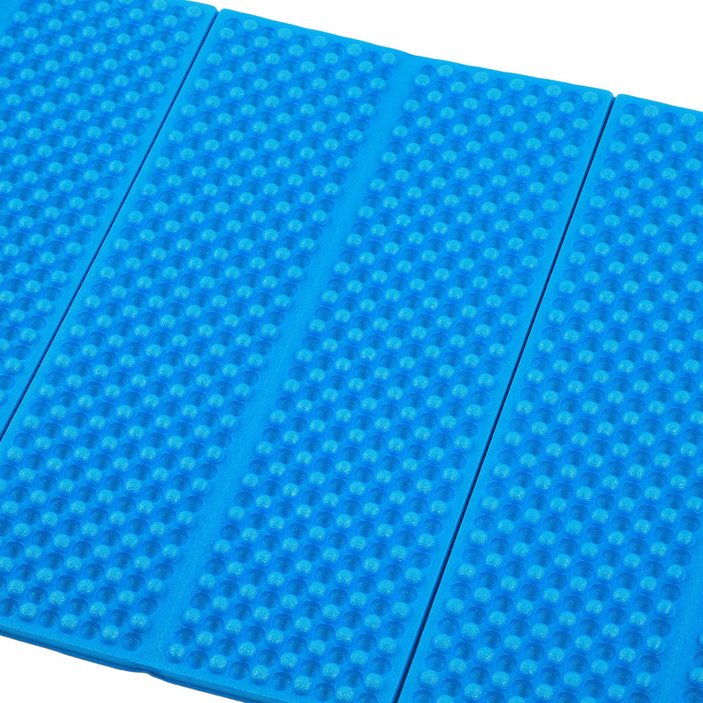 Keenso Double Egg Crate Sleeping Pad rolled compact blue shows easy packing and storage.