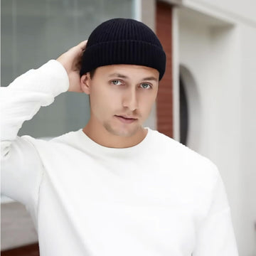Unisex KEEPFLY Beanie worn by model, winter warmth in Black