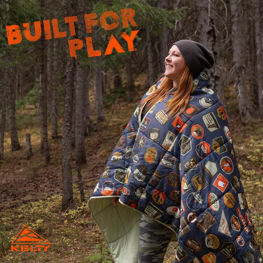 Kelty Bestie Blanket in use camping, versatile on rocks and grass
