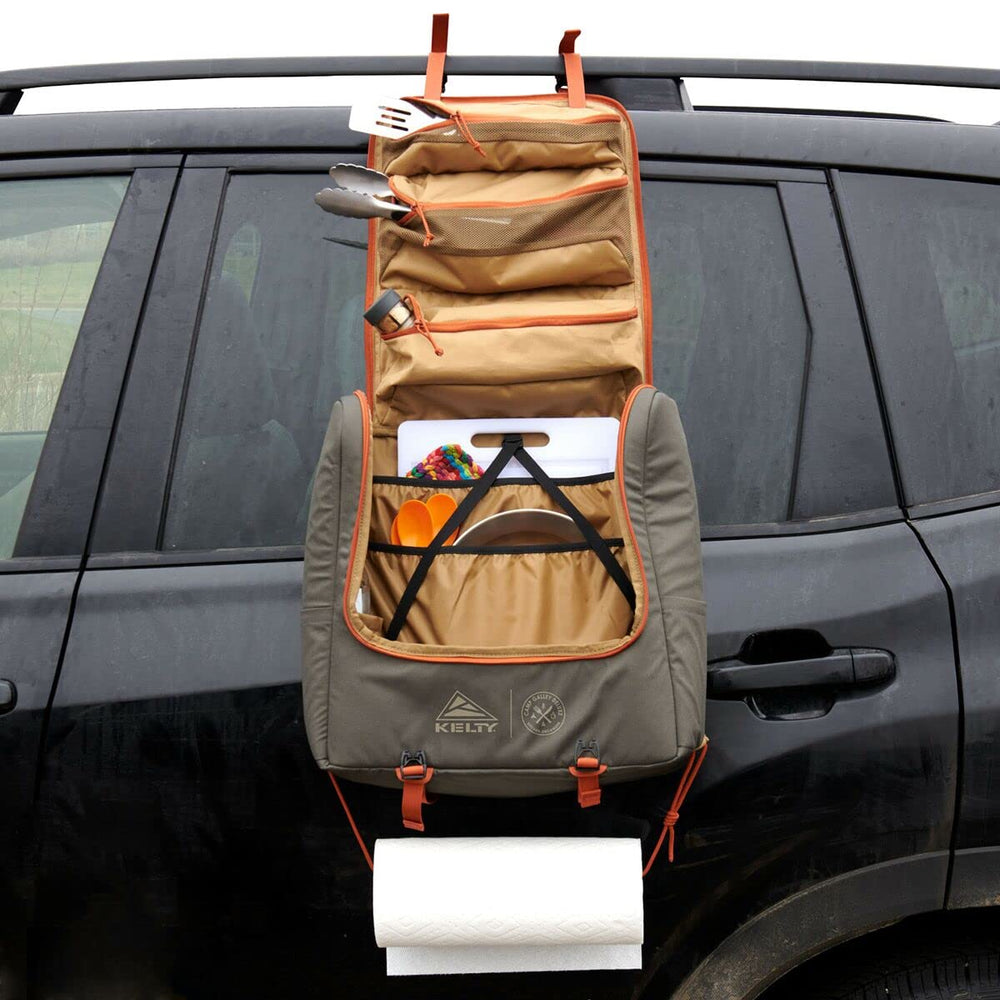 Kelty Camp Galley Deluxe deep waterproof pocket keeps cans and trash secure.