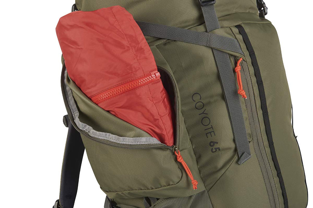 Kelty Coyote 65L sleeping bag pocket keeps bulk gear organized.
