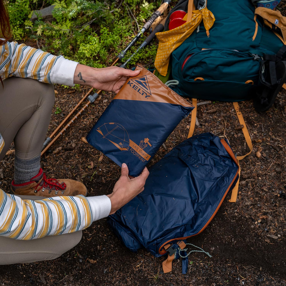 Kelty Late Start footprint supports eco-conscious camping with durable, low-impact materials.