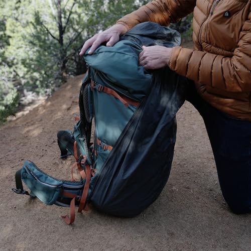 Kelty hip-belt attachment loops secure cover during movement.