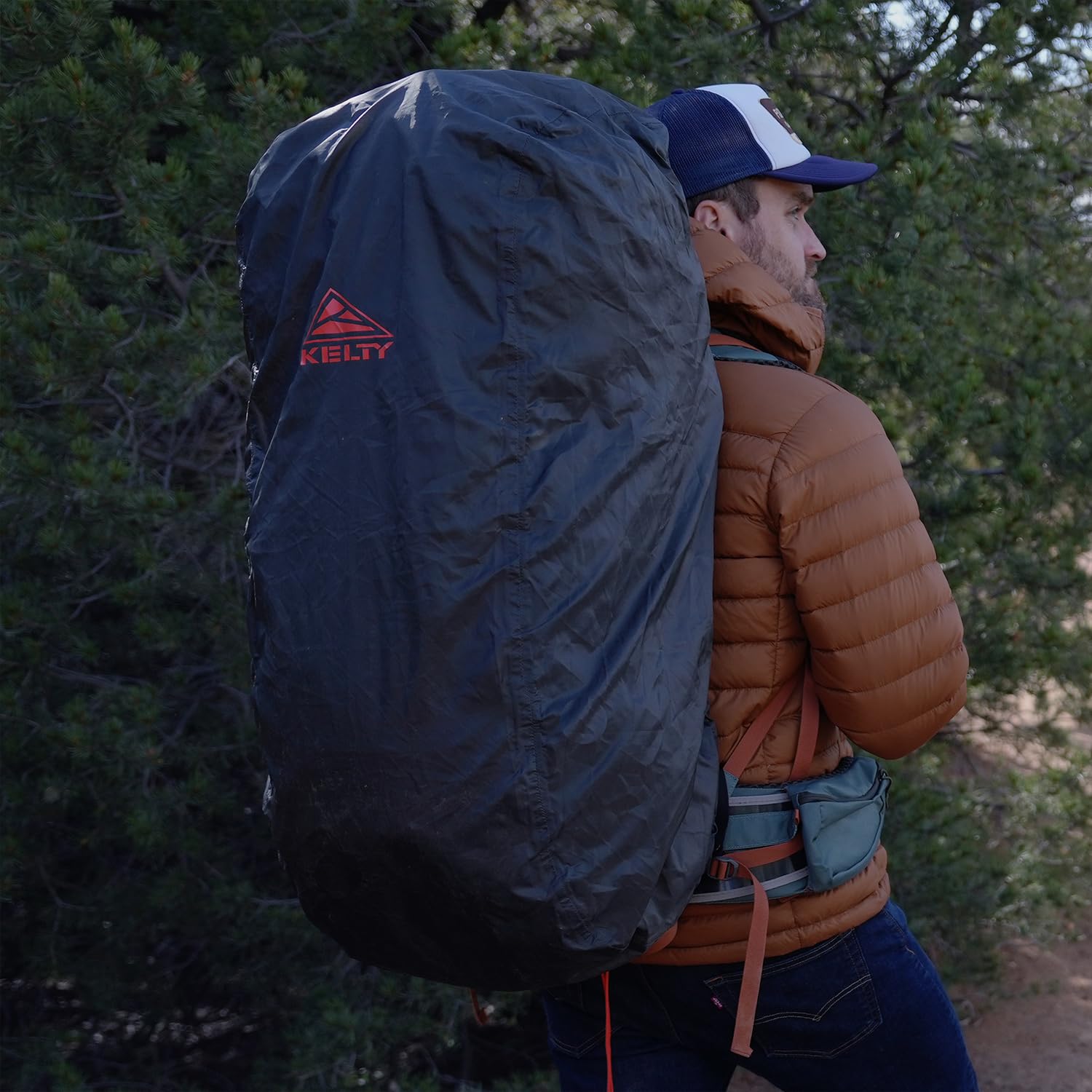 Integrated pocket of Kelty rain cover stows neatly after deployment