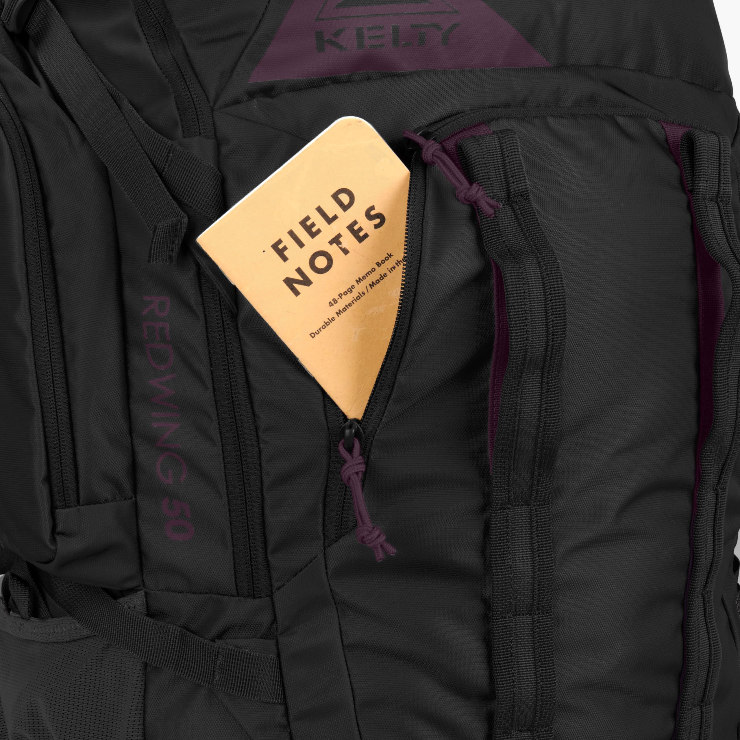 Kelty Redwing 50 side pocket close-up illustrating compression straps