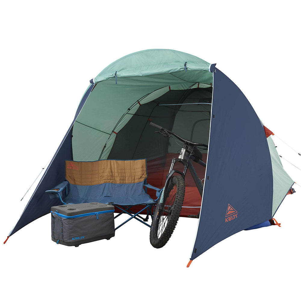 Kelty Rumpus freestanding design demonstrates quick setup on varied ground.