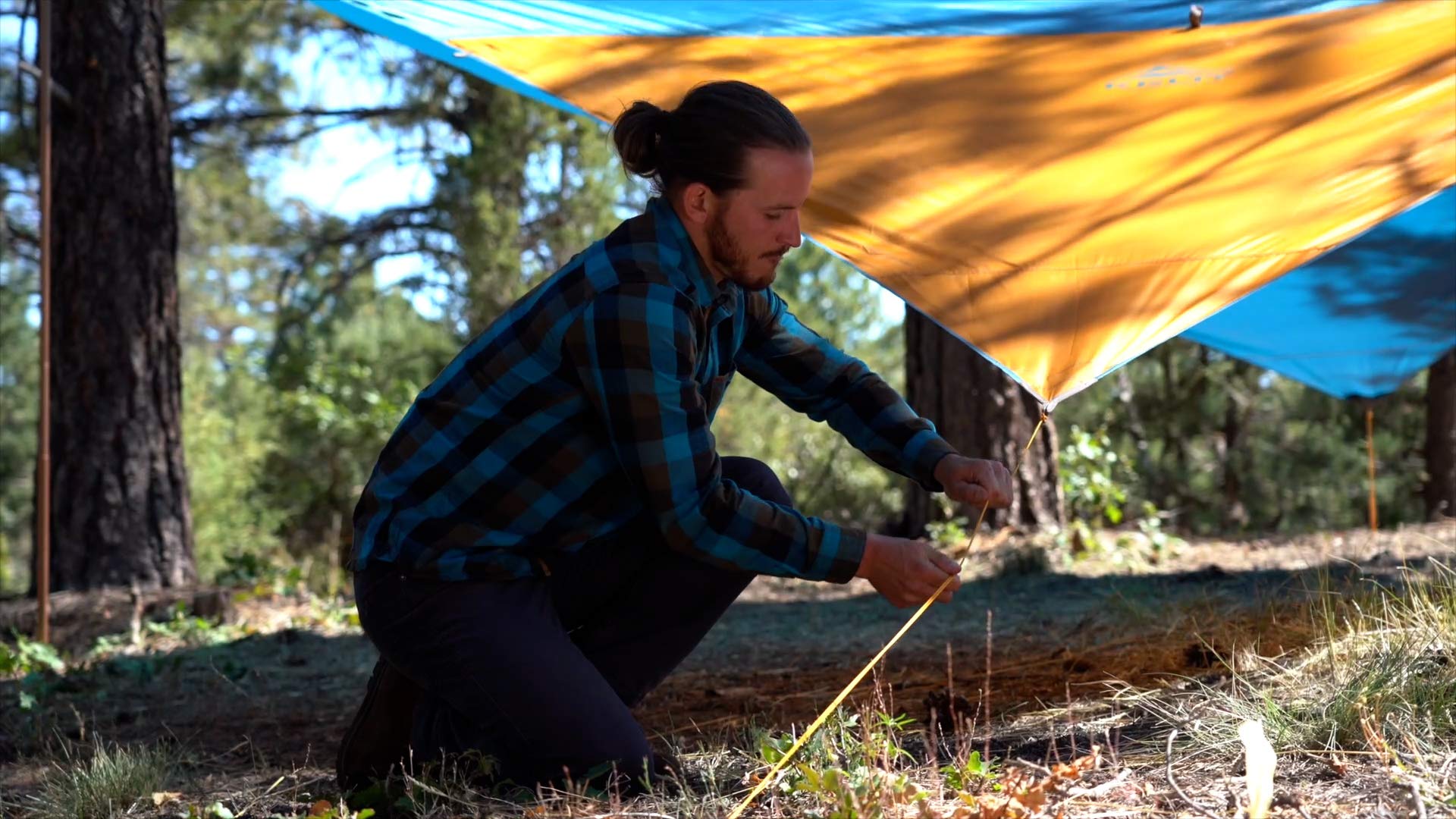 Bright yellow Kelty Lightline rope helps you set up tents and tarps at night