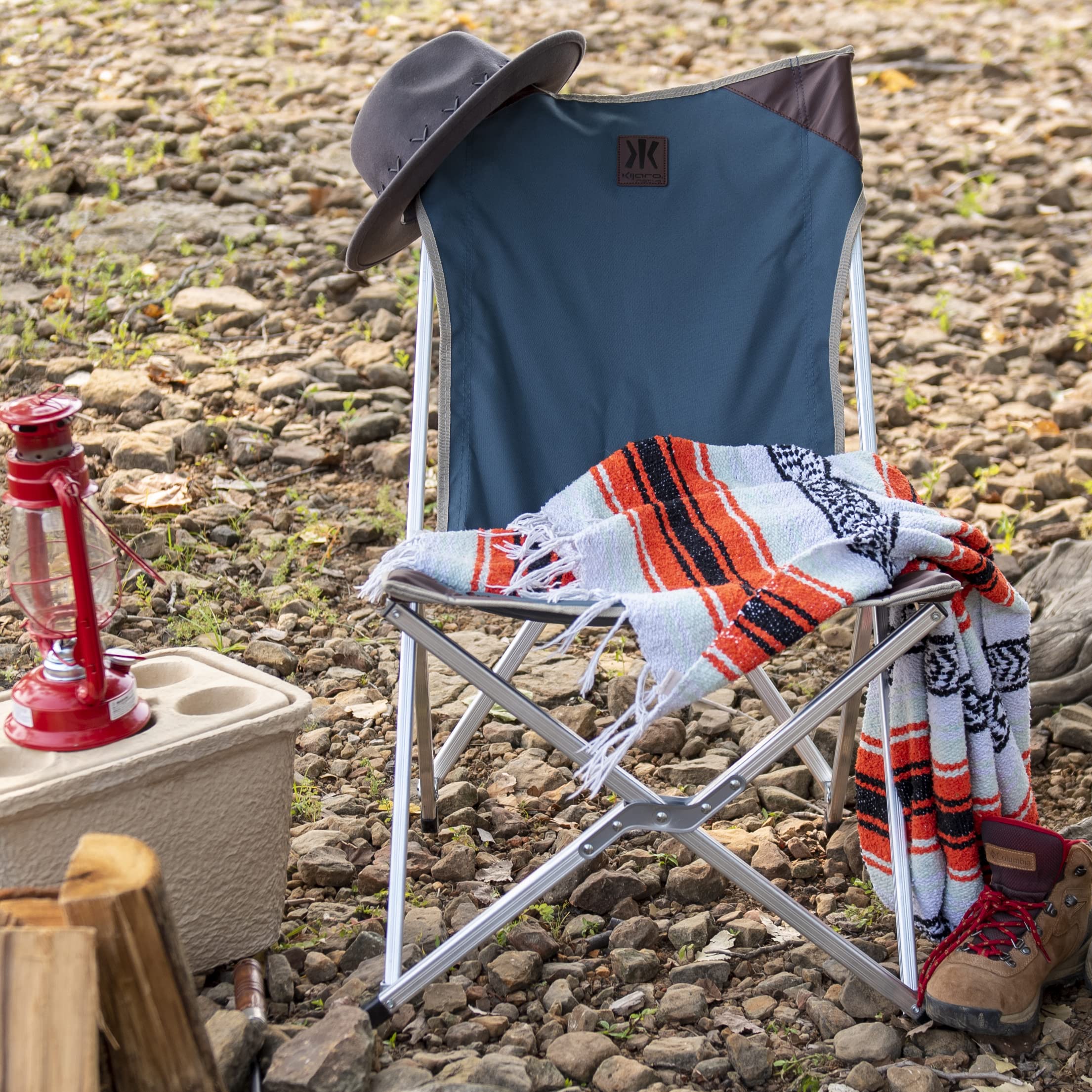 Kijaro Native Comfort Chair folded and tucked into its carry bag for travel.
