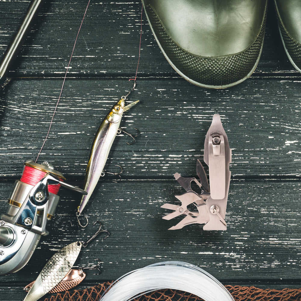 Scissors, screwdriver, and split ring opener arranged for use