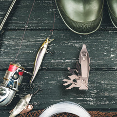 Scissors, screwdriver, and split ring opener arranged for use