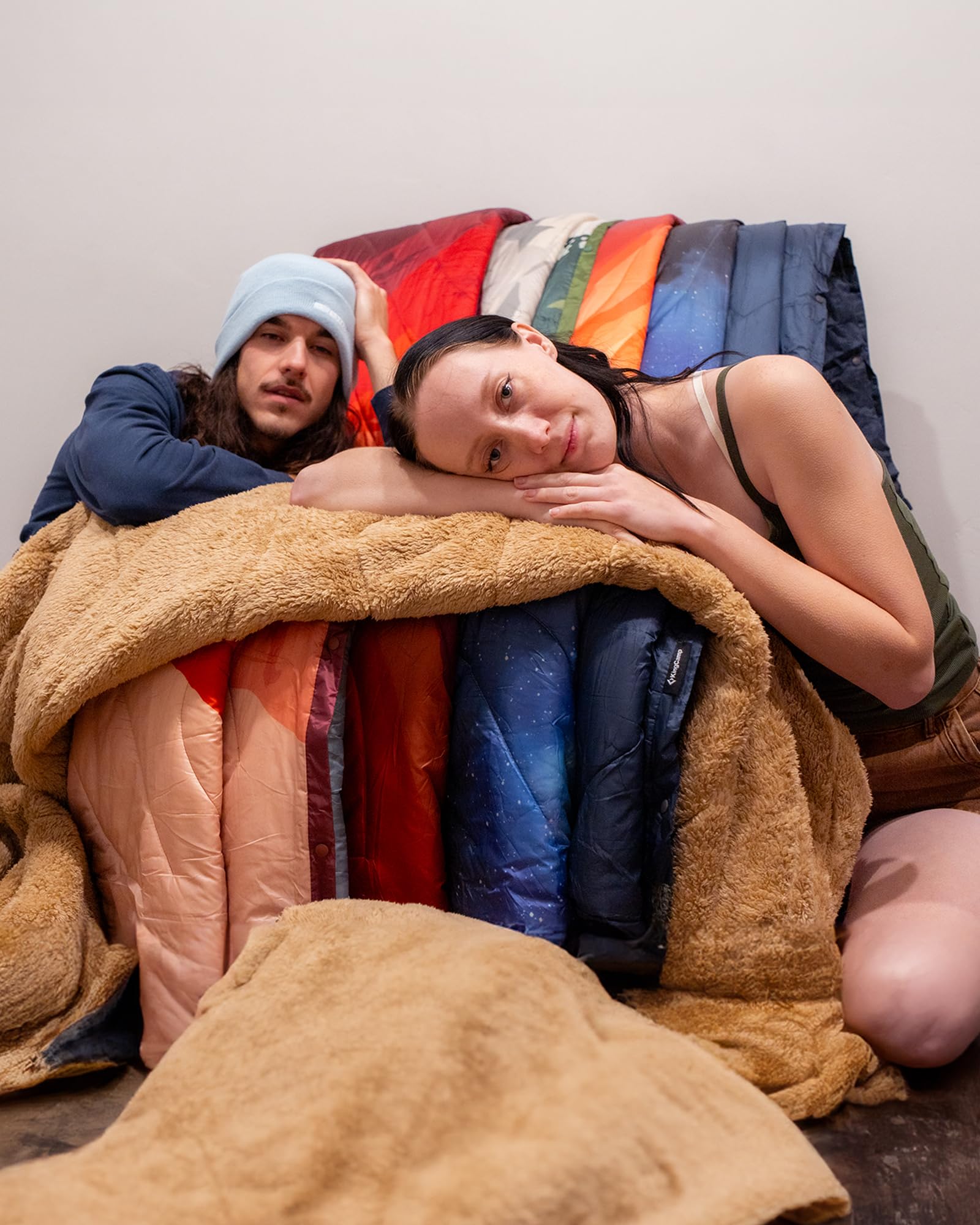 KingCamp large camping blanket worn as a shawl for hands-free warmth