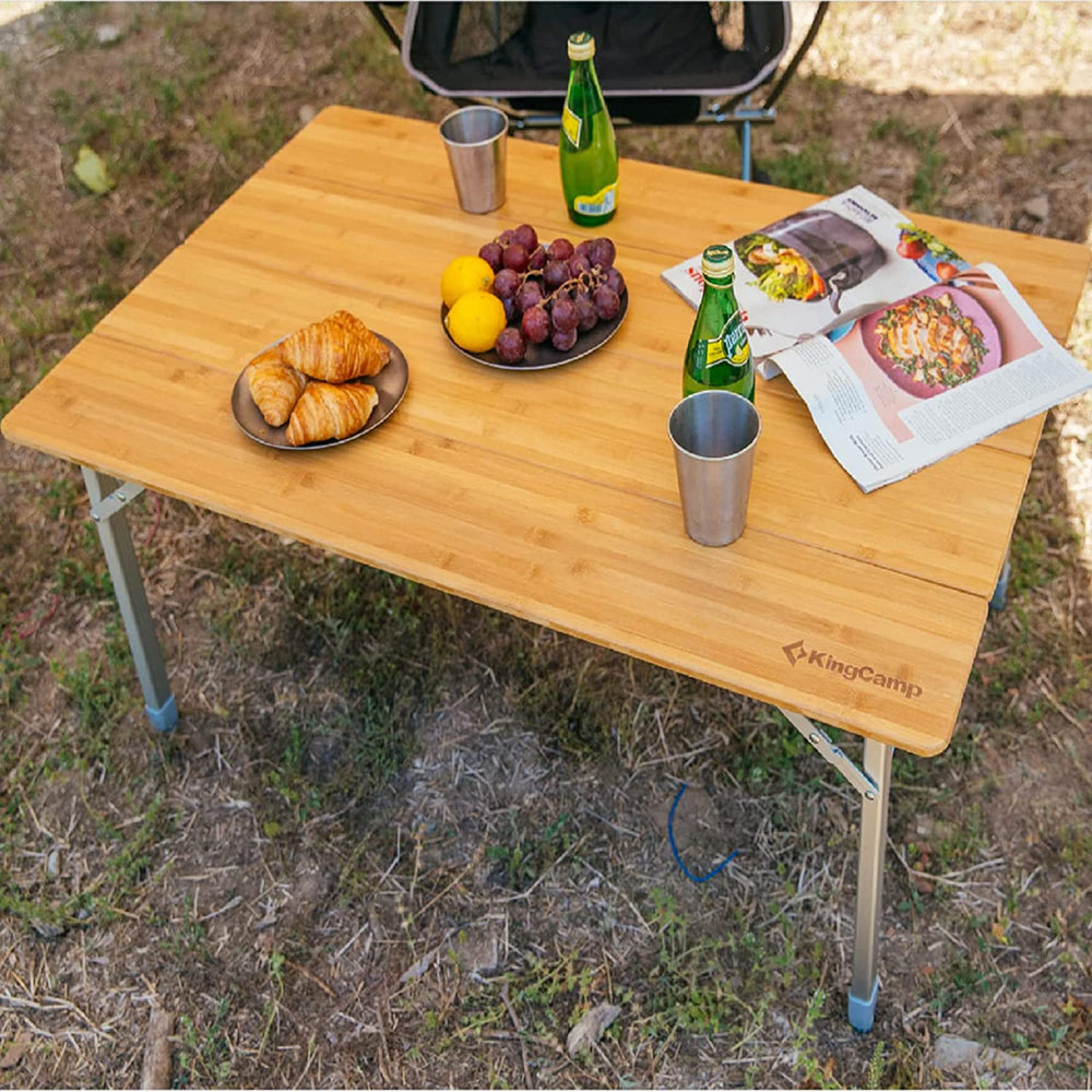 KingCamp portable camping table setup ready for meals outdoors.