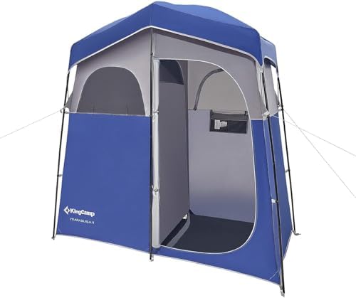 KingCamp shower tent interior with hooks shows organized storage for bags and clothing