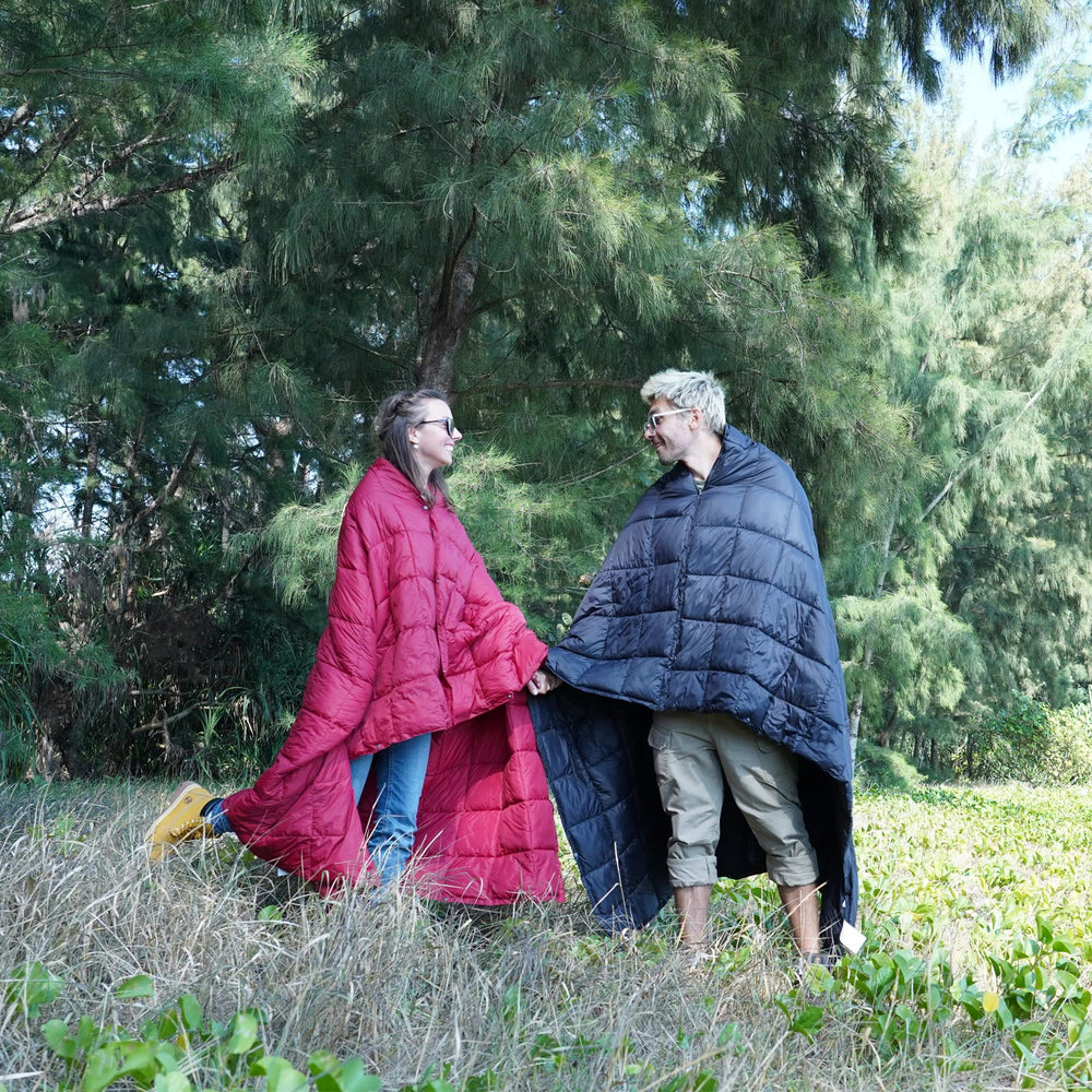 KingCamp blanket worn as a shawl keeps hands free during outdoor activities