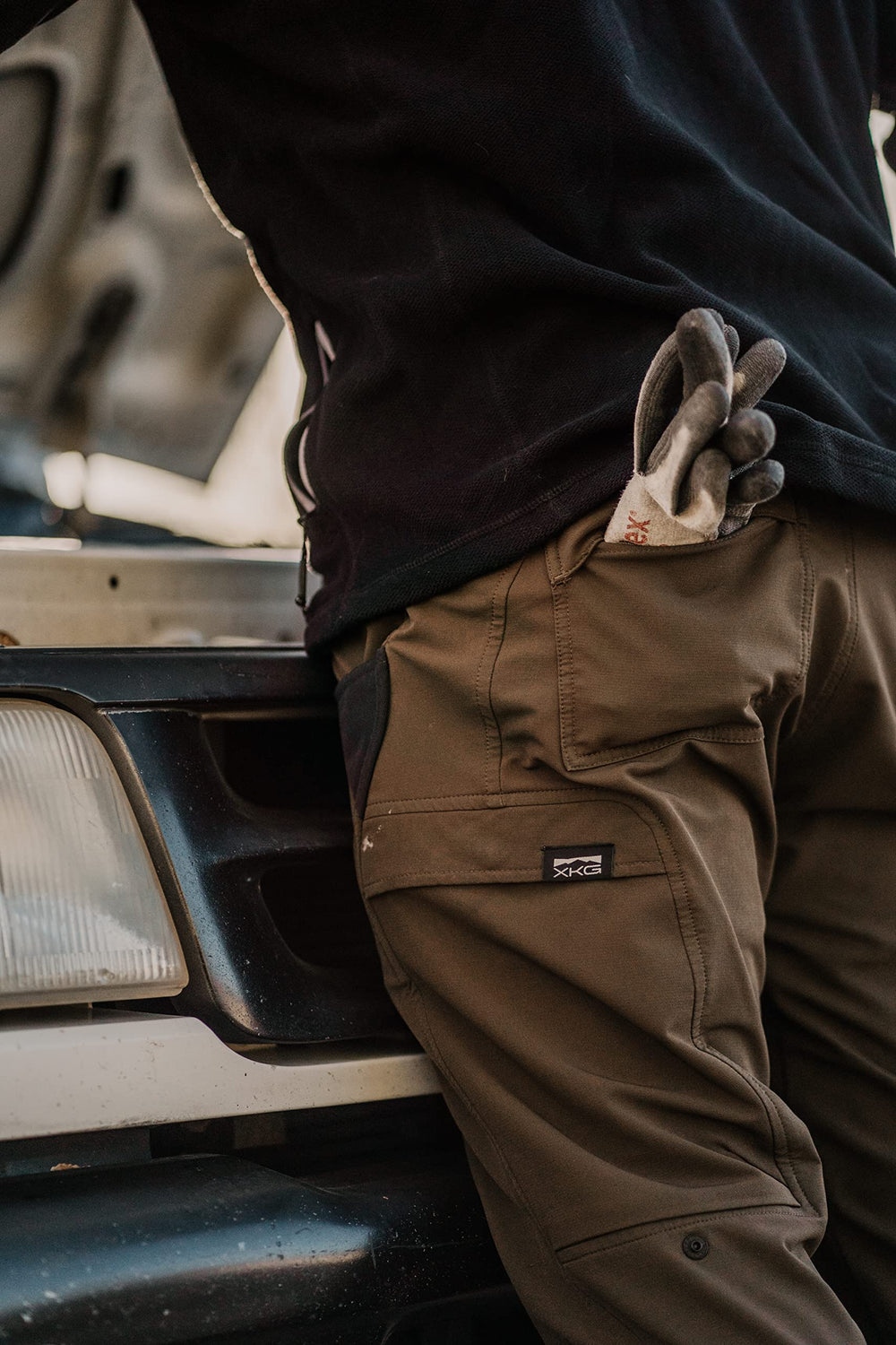 King's Camo XKG Ridge Pant XK7 water-resistant fabric in rugged terrain