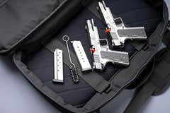 Close-up of Kleen-Bore MAG & WELL BRUSH showing bristles and handle.