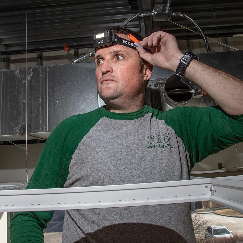 Klein Tools 56049 headlamp attached to hard hat for safety