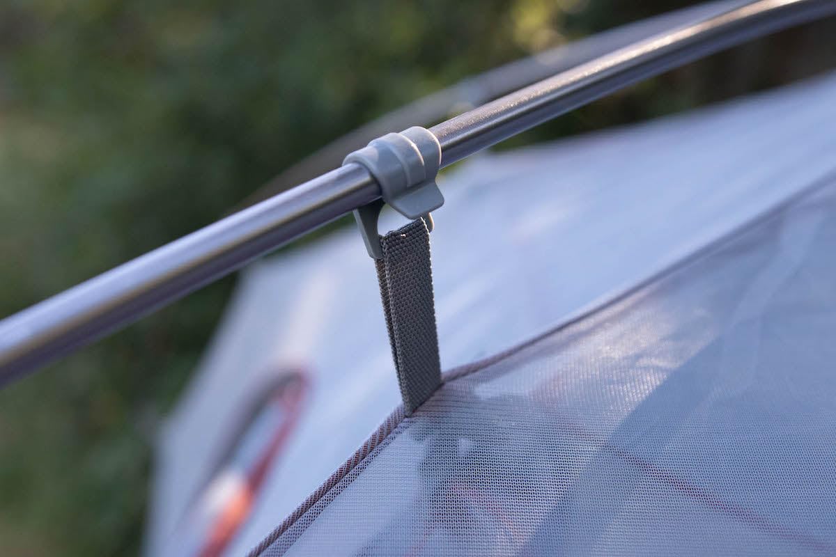 Klymit Cross Canyon 3-Person vestibule storage keeps gear protected outdoors.