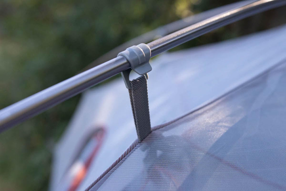 Klymit Cross Canyon 3-Person vestibule storage keeps gear protected outdoors.