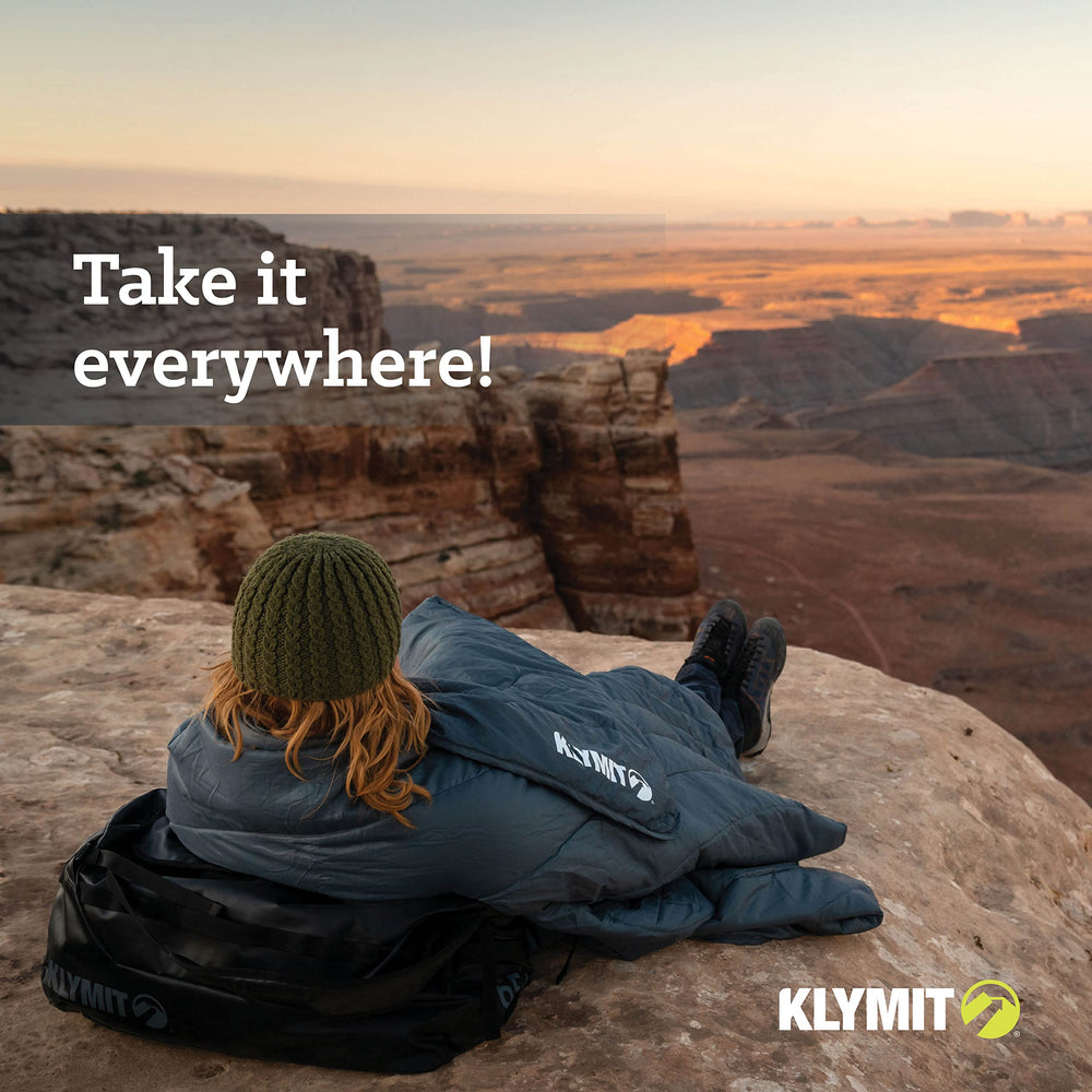 Klymit Horizon Travel Blanket used for a picnic with ample coverage