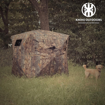 KNINE OUTDOORS hunting blind showing sliding windows for silent angles