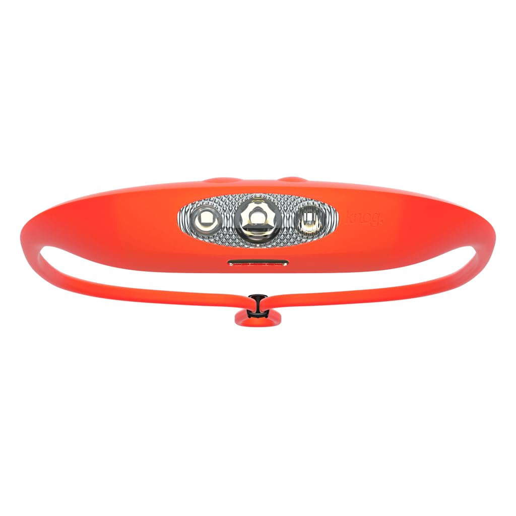 KNOG Bandicoot 250 headlamp on head in coral for hands-free outdoor lighting