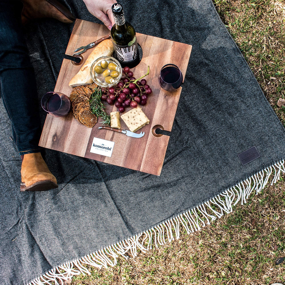 Komorebi picnic blanket bronze-brushed buckles and leather straps